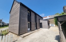 Isolation par l'extérieur bardage douglas et joint debout aluminiumChampéon